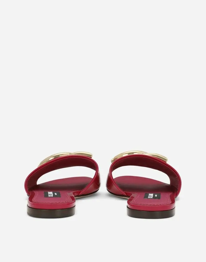 Dolce and Gabbana Slides And Mules Women Polished Calfskin Sliders With DG Logo Fuchsia Dolce and Gabbana Slides And Mules Women Polished Calfskin Sliders With DG Logo Fuchsia