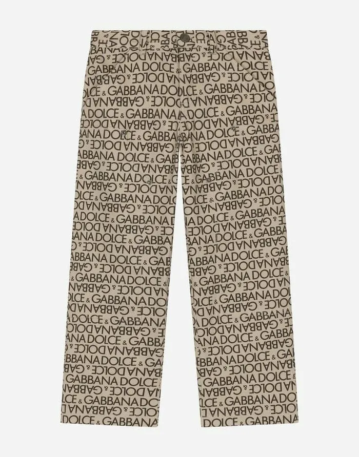 Dolce and Gabbana Trousers And Shorts Children Printed Denim Pants With Allover Logo Beige Dolce and Gabbana Trousers And Shorts Children Printed Denim Pants With Allover Logo Beige